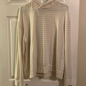 beige and white striped hooded lightweight sweatshirt